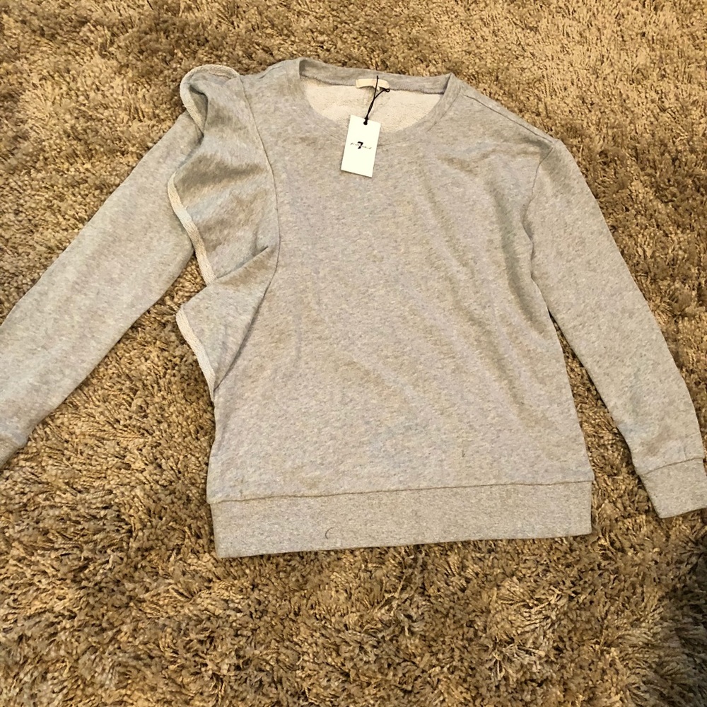 7 for all mankind. Sweater with ruffle.